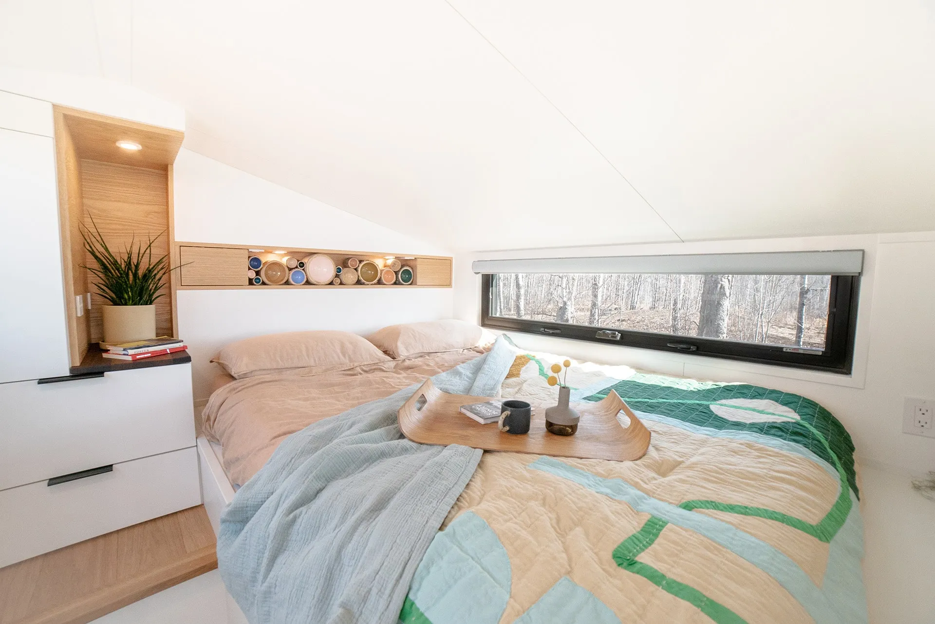 aqua tiny homes small and cozy interior bedroom with queen size bed 